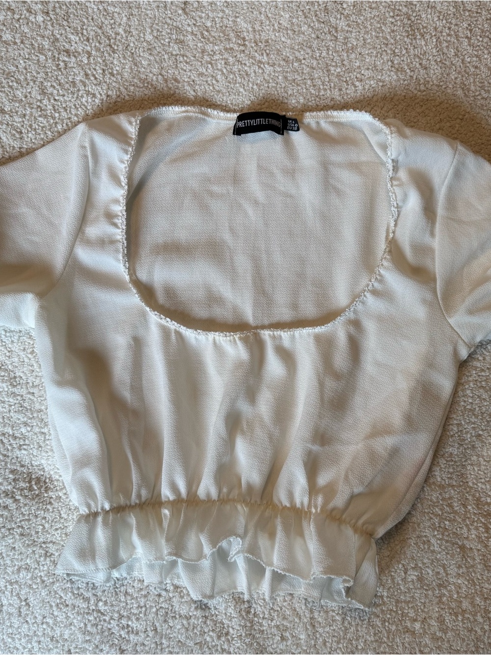 PrettyLittleThing Cream Scoop Neck Peplum Crop Top